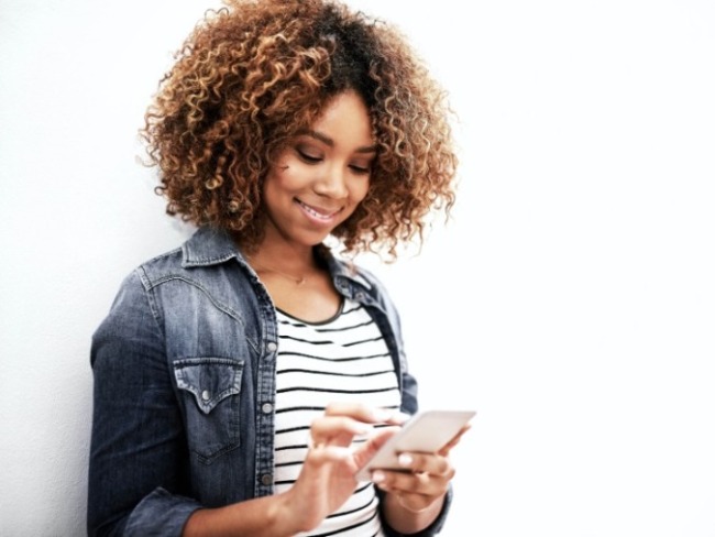 woman on phone on white background